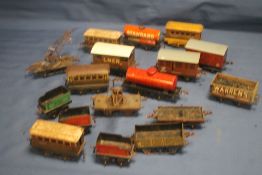 SEVENTEEN MAINLY TINPLATE RAILWAY CARRIAGES AND ROLLING STOCK, to include Hornby (Boxes and trays