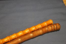 TWO ANTIQUE JAPANESE WALKING CANES WITH TYPICAL DECORATION