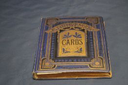 AN ALBUM OF VINTAGE GREETINGS CARDS ETC