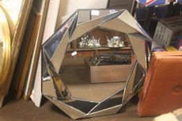 A MODERN WALL MIRROR