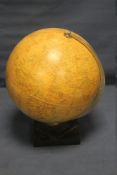 A MID 20TH CENTURY PHILIPS 10 CHALLENGE GLOBE ON STEPPED BAKELITE BASE