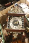 A REPRODUCTION WALL CLOCK WITH BRASS WEIGHTS
