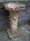 A CONCRETE BIRD BATH A/F
