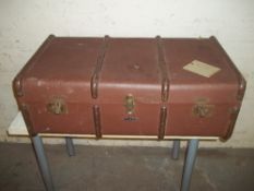 A FOUR BANDED STEAMER TRAVEL TRUNK