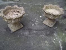 TWO CONCRETE GARDEN PLANTER URNS AND PEDESTALS