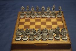 A CASED CHESS SET WITH FITTED DRAWERS |SPANISH ARMADA|