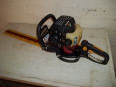 A PETROL RY0B1 HOMELITE HEDGE TRIMMER