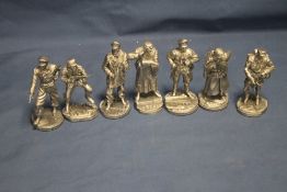 SEVEN PEWTER FIGURES OF GERMAN SOLDIERS AND SAILORS TO INCLUDDE A YEW BOAT CAPTAIN A GRENADIER,