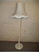 A FLOOR STANDING STANDARD LAMP