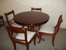 A MODERN ROUND DINING SET TABLE AND 4 CHAIRS