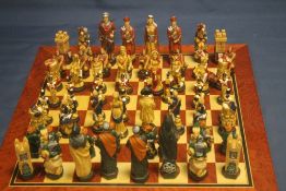 A BOXED STUDIO ANNE CARLTON CHESS SET |CRUSADERS| TOGETHER WITH ANOTHER
