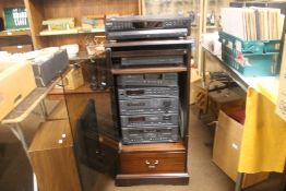 A VINTAGE VHS VIDEO PLAYER TOGETHER WITH A SONY STEREO SYSTEM AND SPEAKERS