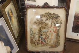 A FRAMED TAPESTRY WITH CARVED FRAME