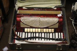 A CASED VERDI ACCORDION