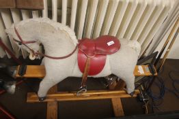 A VINTAGE CHILDS PEGASUS ROCKING HORSE, with plaque to the frame