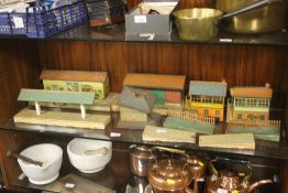 A COLLECTION OF HORNBY TINPLATE PLATFORMS, together with a collection of tinplate buildings (Boxes