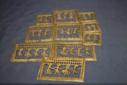 A COLLECTION OF BRASS PLAQUES DEPICTING FIGURES