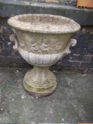 A LARGE CONCRETE GARDEN PLANTER URN AND PEDESTAL