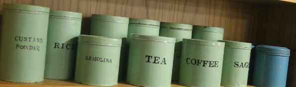 A SET OF 1940'S GREEN PAINTED TIN KITCHEN STORAGE JARS