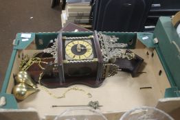 A MODERN HANGING WALL CLOCK WITH PENDULUM AND WEIGHTS