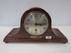 A MAHOGANY NAPOLEON HAT MANTLE CLOCK