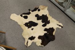 A VINTAGE COW HIDE