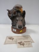 A LIMITED EDITION WILDLIFE SCULPTURE OF A WOLF / OWL & EAGLE ENTITLED 'TRACES', BY PAUL R CARRICO,