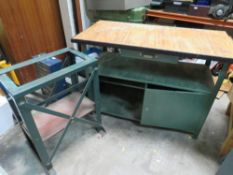 A STEEL WORKSHOP BENCH TOGETHER WITH AN INDUSTRIAL STEEL FRAMED TRESTLE TABLE