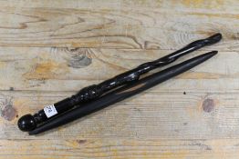 AN EAST AFRICAN MAKONODE CLUB FROM TANZANIA WITH CARVED HEAD AND A SUDANESE DINKA THROWING CLUB