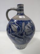 A EUROPEAN STYLE POTTERY VESSEL WITH SCRAFFITO TYPE DECORATION, S/D