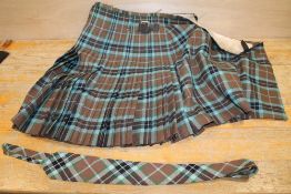 A VINTAGE KILT TOGETHER WITH MATCHING TIE