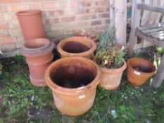 A QUANTITY OF 9 ASSORTED TERRACOTTA GARDEN PLANTERS TO INCLUDE 2 CHIMNEY POTS