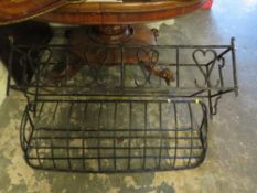 TWO DECORATIVE WROUGHT IRON WALL PLANTERS