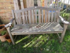 A HARDWOOD GARDEN BENCH