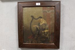 AN ANTIQUE FRAMED UNSIGNED OIL ON CANVAS DEPICTING A BEARDED MAN PLAYING A HARP