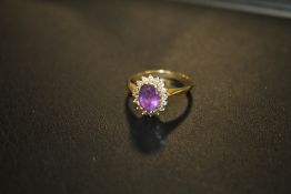A HALLMARKED 18CT GOLD AMETHYST AND DIAMOND DRESS RING, APPROX 3.6 G, RING SIZE O ;