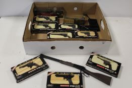 A QUANTITY OF BOXED ARMODELLI MINIATURE GUNS ETC.
