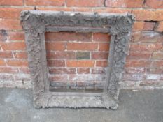 AN EARLY 19TH CENTURY GILTWOOD PICTURE FRAME WITH SUBSTANTIAL FOLIATE MOULDING, rebate 50.5 x 45.5