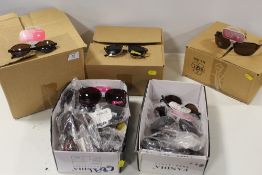 FIVE BOXES OF PACKAGED SUN GLASSES