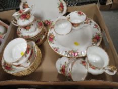 A TRAY OF ROYAL ALBERT OLD COUNTRY ROSES CHINA TO INCLUDE CUPS AND SAUCERS, DINING PLATES ETC.