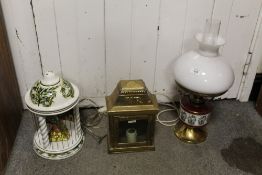A CONVERTED OIL LAMP WITH CERAMIC FONT, TOGETHER WITH A MODERN CERAMIC TABLE LAMP AND A REPRODUCTION
