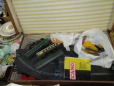 A SUITCASE OF SCALEXTRIC, 00 GAUGE MODEL RAILWAY CARRIAGES, MECCANO ETC.
