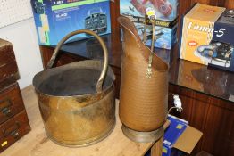 A BRASS COAL SCUTTLE TOGETHER WITH A COPPER EXAMPLE
