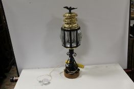 A VINTAGE TABLE LAMP WITH EAGLE FINIAL