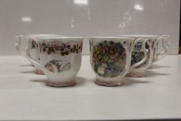 A SET OF SIX ROYAL DOULTON BRAMBLY HEDGE 'AUTUMN' PATTERN BEAKERS / MUGS