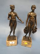 A PAIR OF CLASSICAL ROMAN STATUES DEPICTING THE WATER CARRIER AND THE ARCHER RAISED ON ONYX BASES