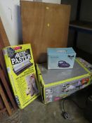 A BOXED EARLEX STEAMER WITH WALLPAPER TRAY, PASTE BOARD AND HAND VACUUM