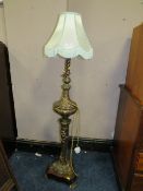 AN UNUSUAL METAL STANDARD LAMP AND SHADE