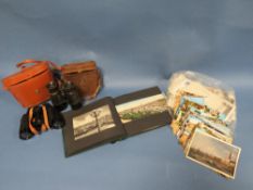 TWO PAIRS OF VINTAGE CASED BINOCULARS AND A SELECTION OF VINTAGE POSTCARDS - LOOSE AND IN AN ALBUM P