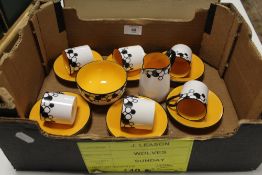 A ROYAL WORCESTER ART DECO PART COFFEE SET COMPRISING SIX COFFEE CANS AND SAUCERS PLUS A CREAM JUG &